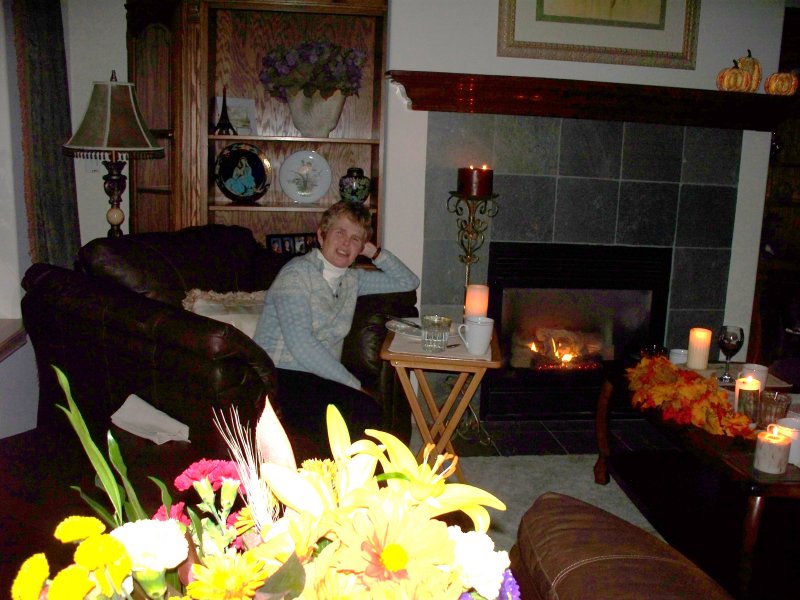 Celia and lots of candles and a warm fireplace